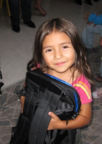A young girl from Colombia who received a Christmas Care pack.
