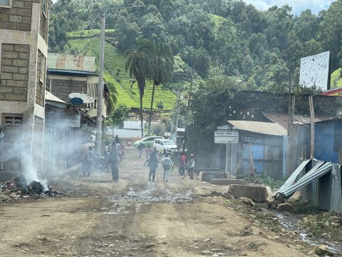 Smoke fills the street of a Kenyan town.