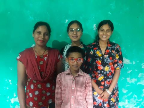 Bindu (left) with her children