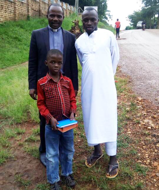 Darweshi and his pastor during a pastoral visit.