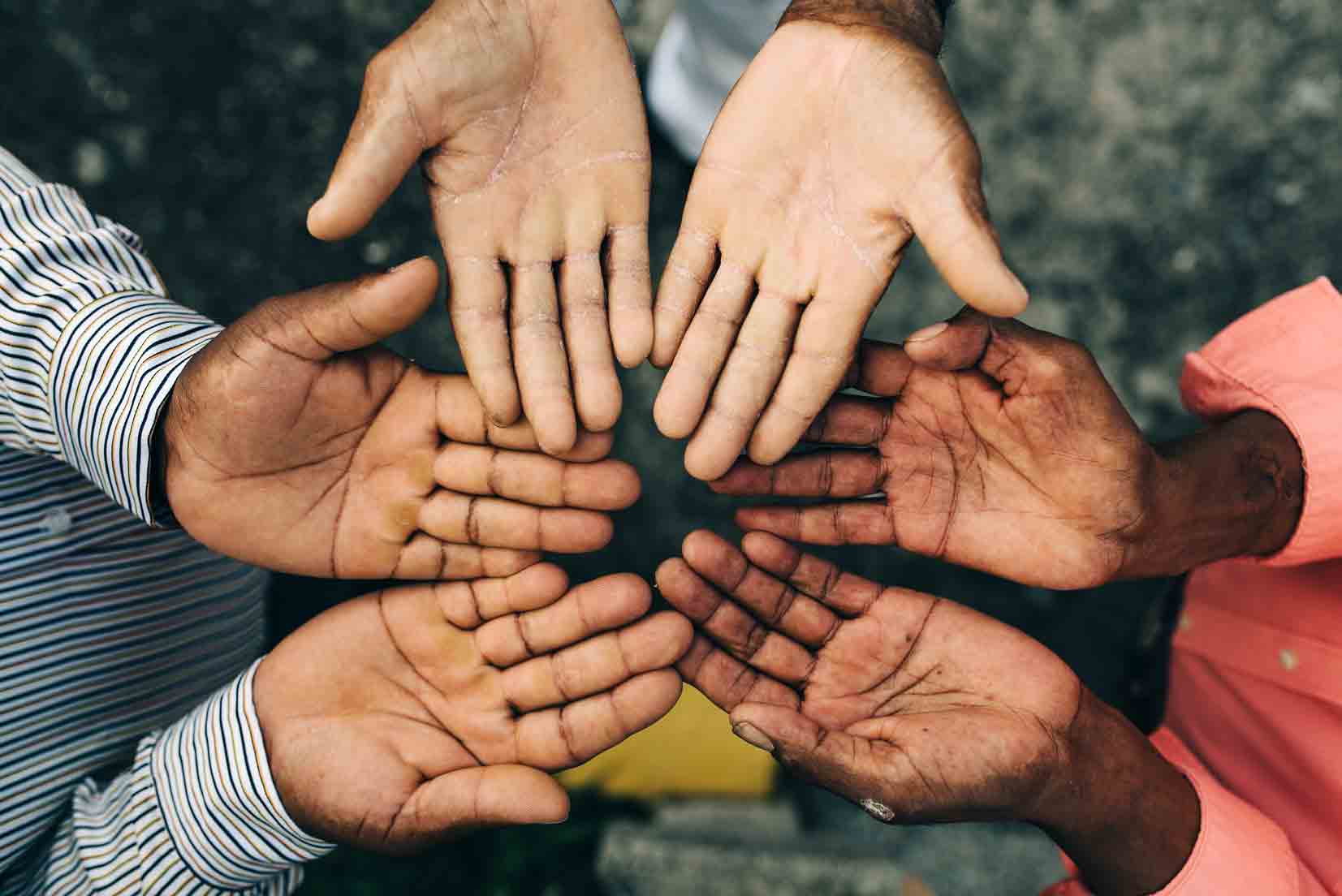These hands carry the gospel throughout the red zones.