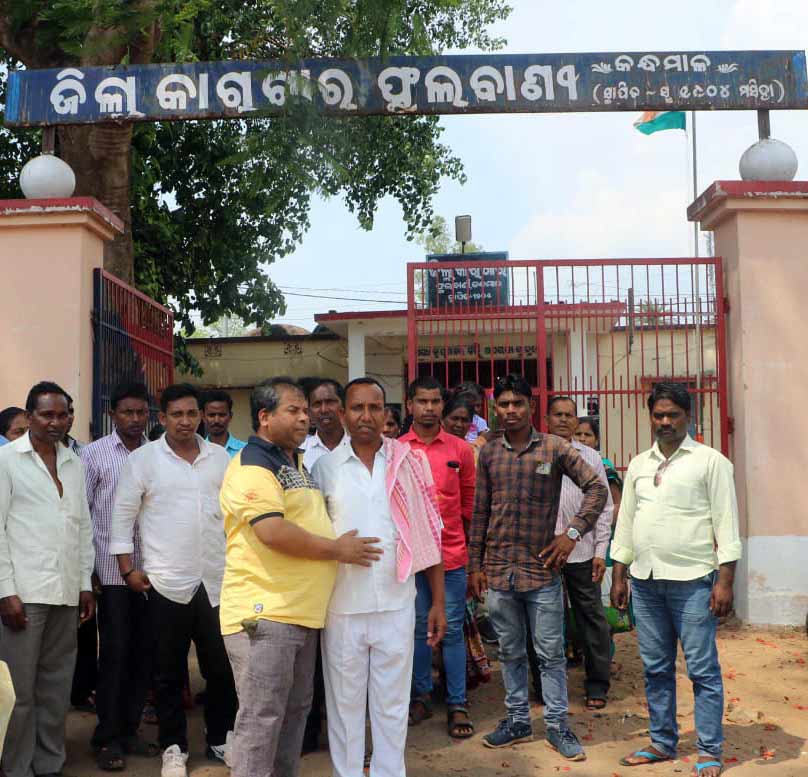 Friends gathered outside the prison for the release of one of the prisoners.