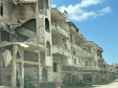 A bullet riddled building in Syria. New fighting has broken out in the city of Suwayda.