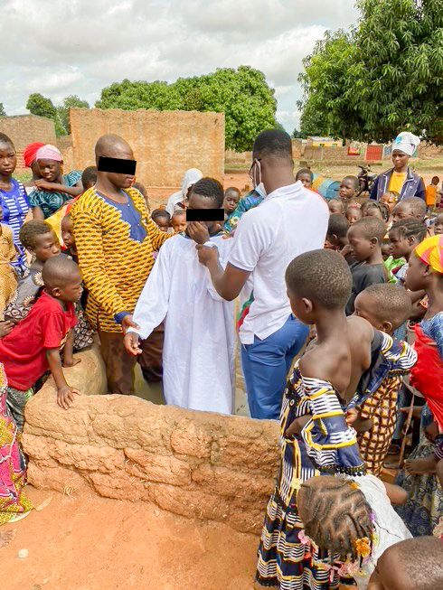 Burkinabe Christians, like these being baptized, are regularly threatened by Islamists in many areas of the country.