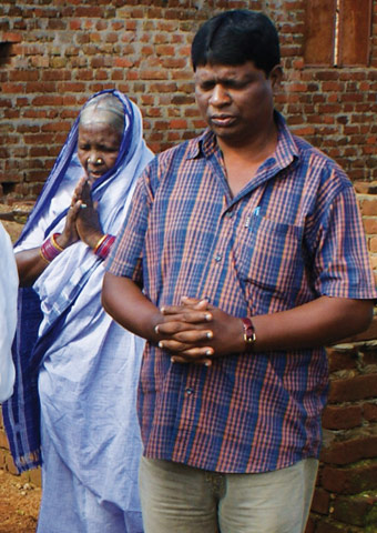 Indian believers pray together.