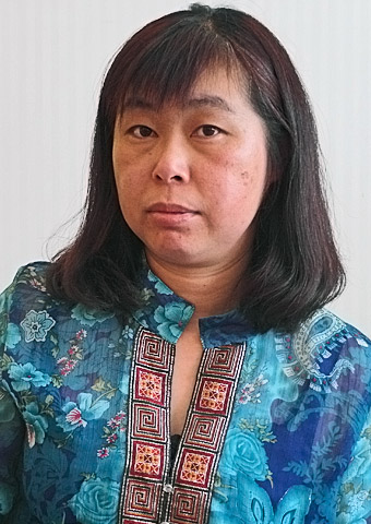Cai Hong Li is the wife of prisoner Wenxi Li, who is imprisoned for involvement with a Christian bookstore.