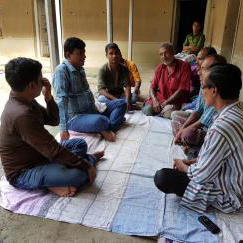 The new believers at the safe house are learning to study the Bible.