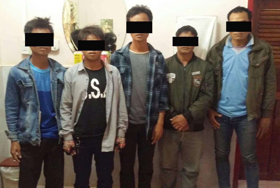 These five men were arrested for holding a Christmas celebration.