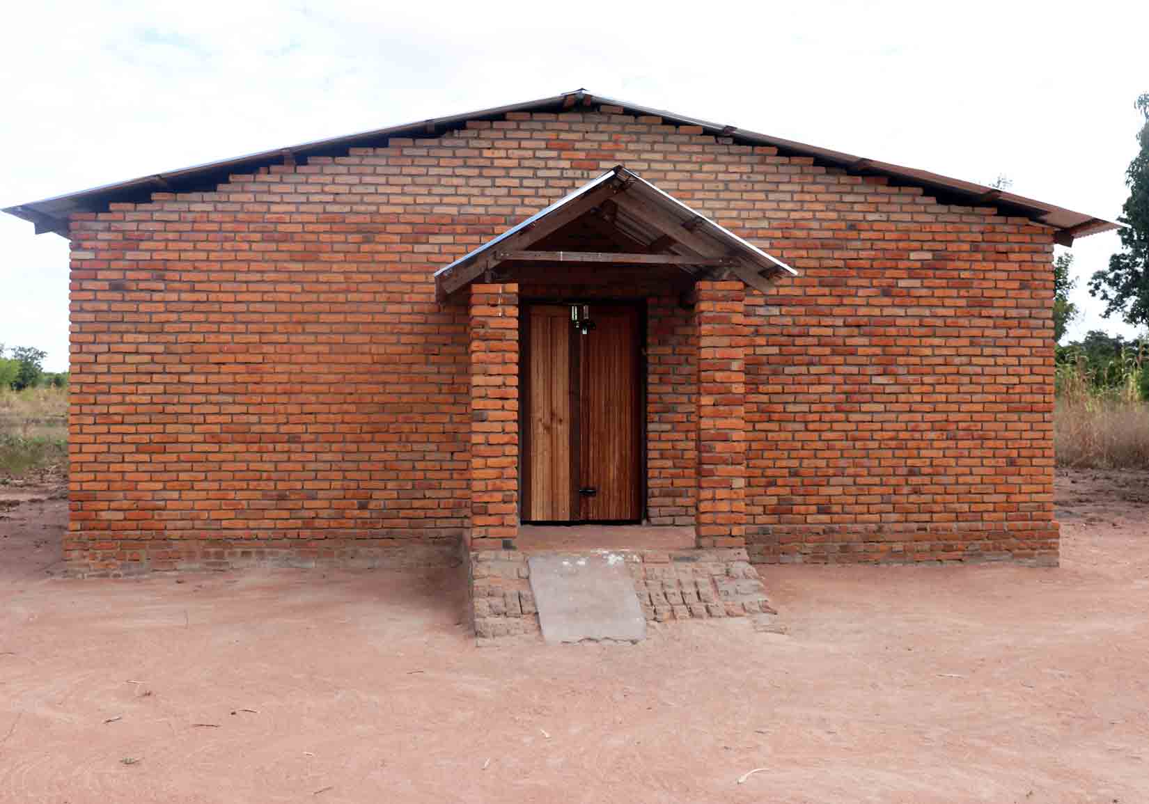 The believers in this church met in the shade of a large tree for many years, until they decided to build a structure. This may be the only Yao church building in existence.