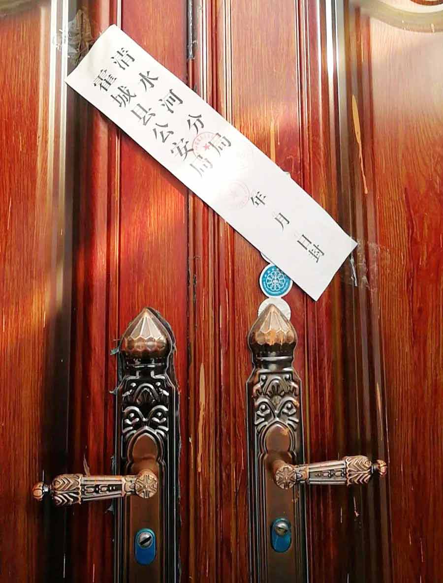 Multiple churches throughout China have been closed, such as this one with an official seal pasted across the doors.