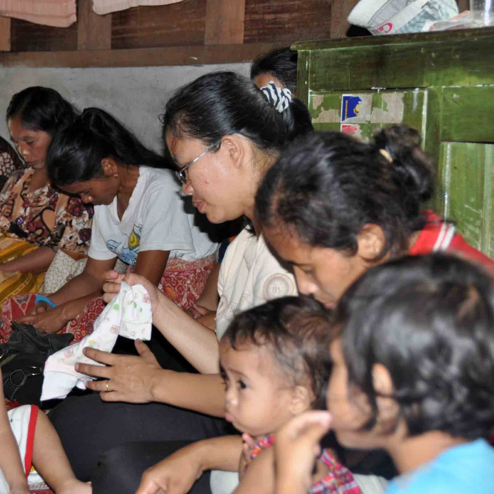 Christians in Indonesia gather in a house church meeting.