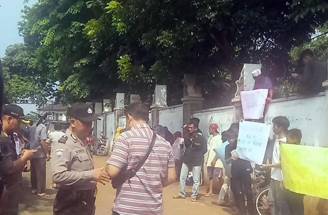 Neighbors protested the church outside as the police met with the pastor.