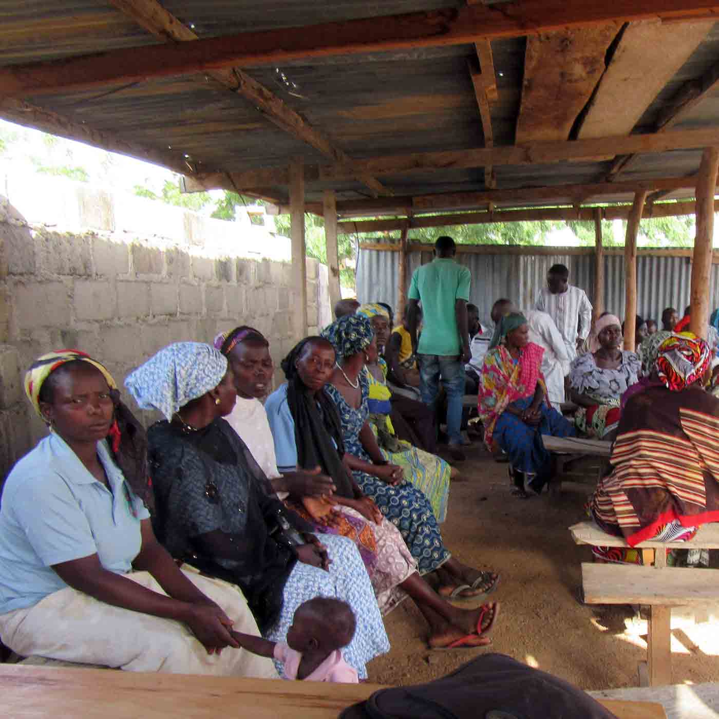 Displaced Nigerian Christians await a food distribution.