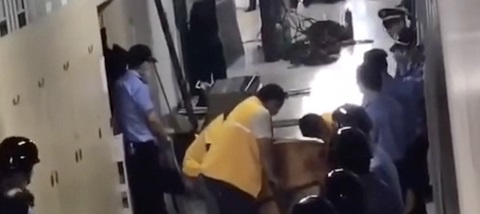More than 100 officials dragged personal belonging into hallways in order to destroy them.