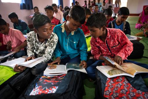 Children receive Christmas Care Packs.