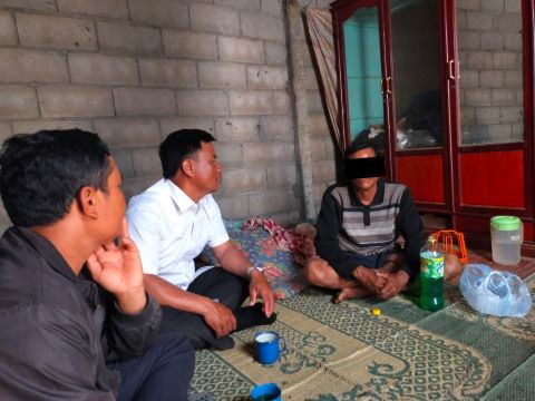 Village authorities fined See (right) after his family hosted worship gatherings in their home.