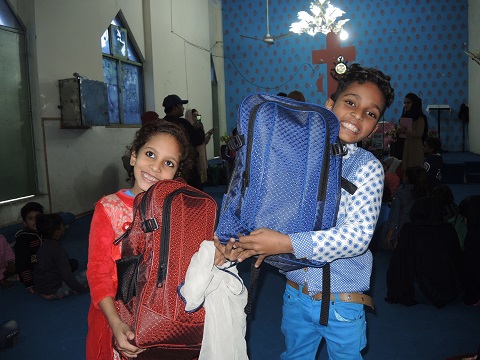 Pakistani children receiving Christmas Care Packs.