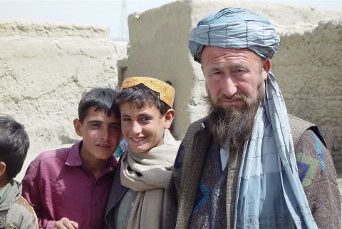 An Afghan man and boys
