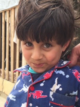 A Syrian child in a refugee camp
