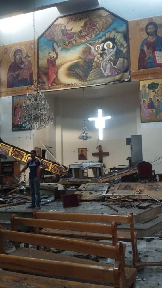 The aftermath of a deadly June 22 attack on a Syrian church during services.