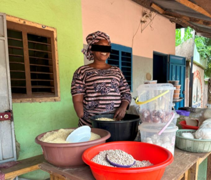 With the help of the global body of Christ, Lenna sells food staples to support herself and her children.