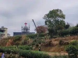 Scaffolding was erected around the belltower of the Yayang church to prepare it for demolition.