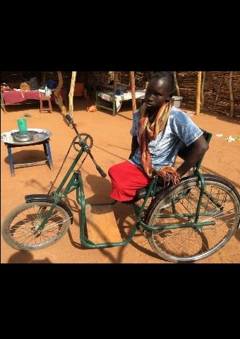 "Esther" was given a wheelchair to help her care for her family in Sudan, where Christians face many hardships for their faith.