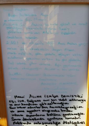 Police have captured the suspect who left this threatening message on the front of a church in Turkey earlier this month.
