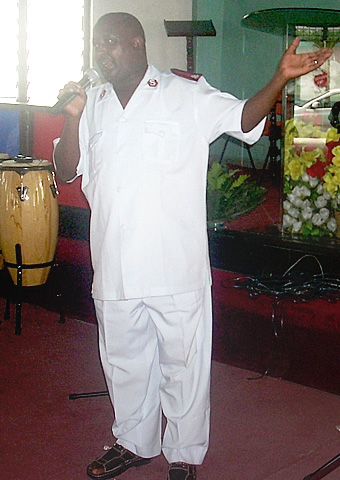 Major Robert Nzioka, preacher at the Salvation Army Church in Mombasa, celebrates during Christmas. The church has been attacked by radical Muslims in the past.