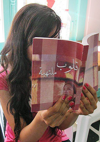 This young woman from Morocco reads a Christian book, "Hearts of Fire."